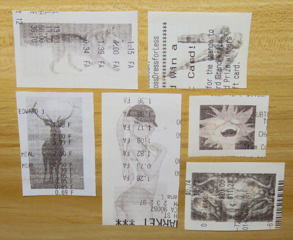 A few pictures printed with the Game Boy Printer on supermarket receipts.  This photo is a close up, the pictures are quite small in reality.